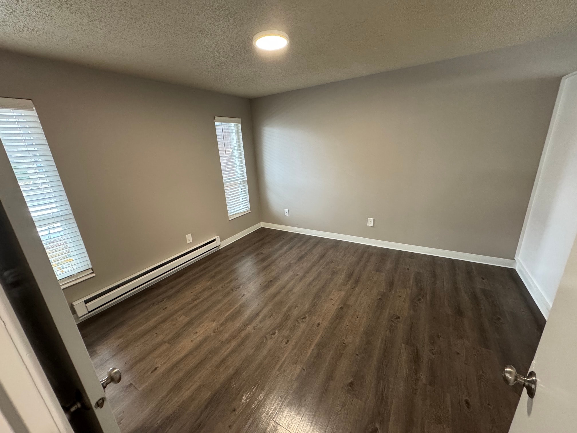 Empty bedroom in a Maison Royale residence